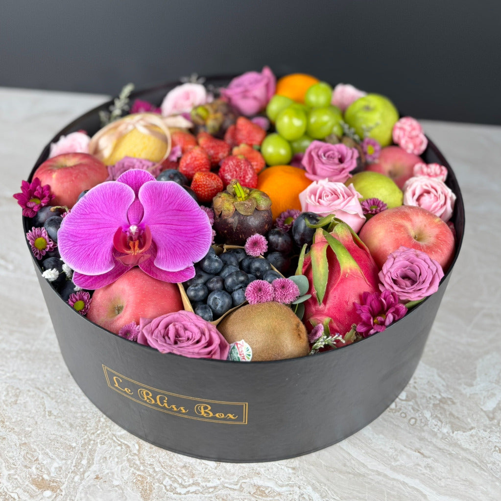 Fruit and flower arrangement in a black box with 'Le Bliss Box' branding. Parcel Buah surabaya, parcel buah jakarta, parcel buah tangerang