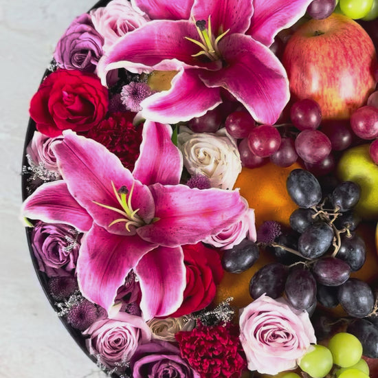 Fruit and flower arrangement for Mother's day gift in a black box with 'La Bliss Box' branding.  Blushing Grand Round Fruit Box | Luxury Fruit Hamper Jakarta, Surabaya 