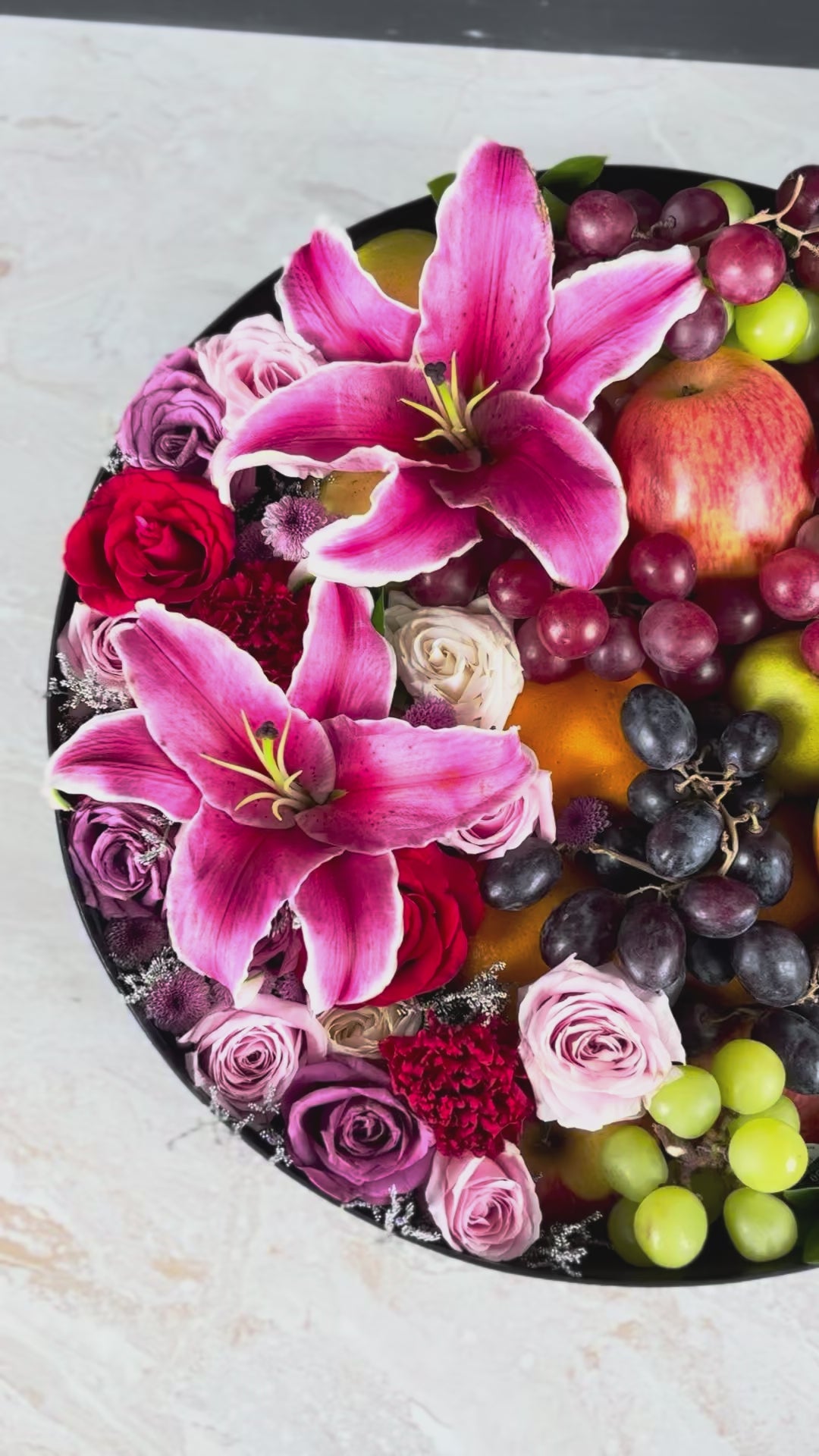 Fruit and flower arrangement for Mother's day gift in a black box with 'La Bliss Box' branding.  Blushing Grand Round Fruit Box | Luxury Fruit Hamper Jakarta, Surabaya 